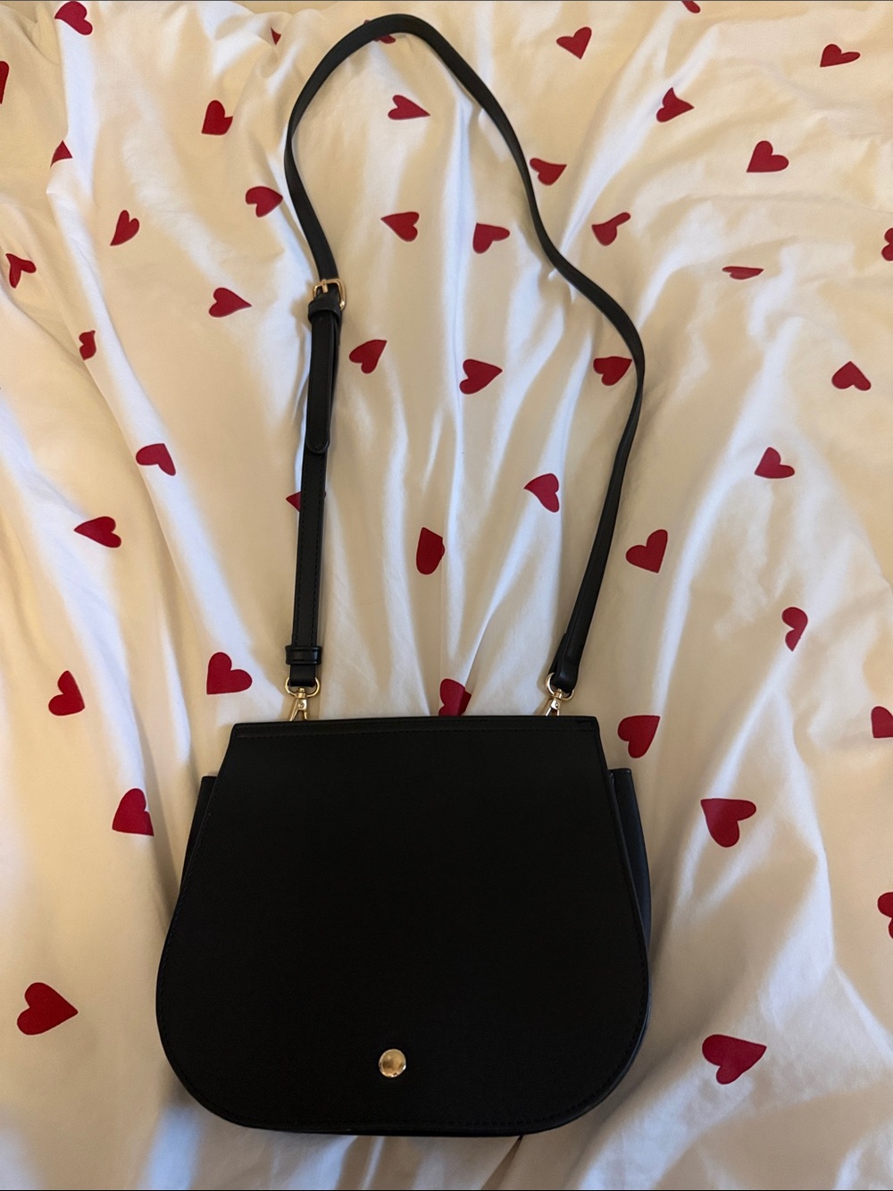 Simons Black Crossbody Bag with Gold Accent